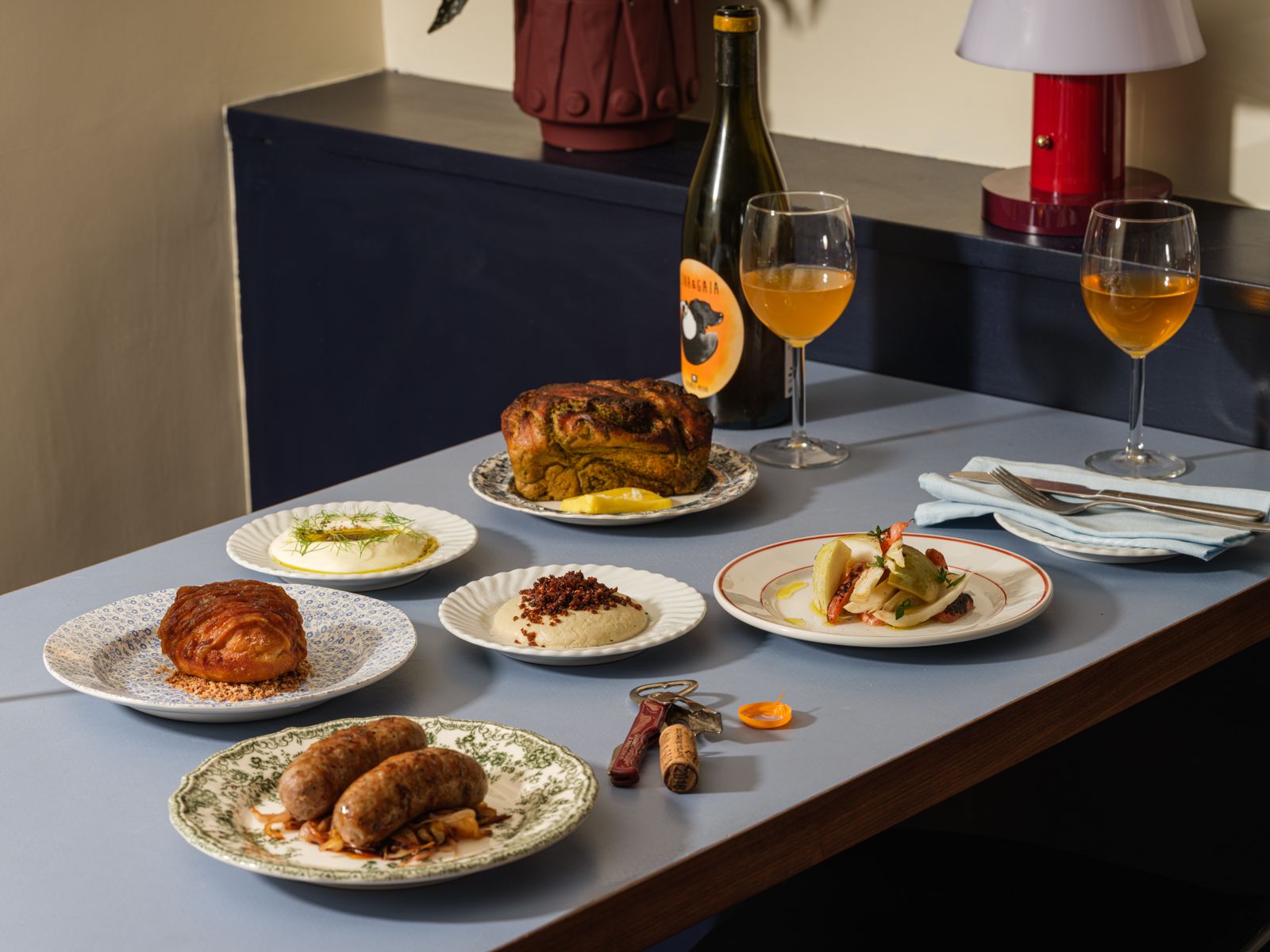 Image may contain Brunch Food Food Presentation Furniture Table Bread Plate Tabletop Blade Knife Weapon and Meal