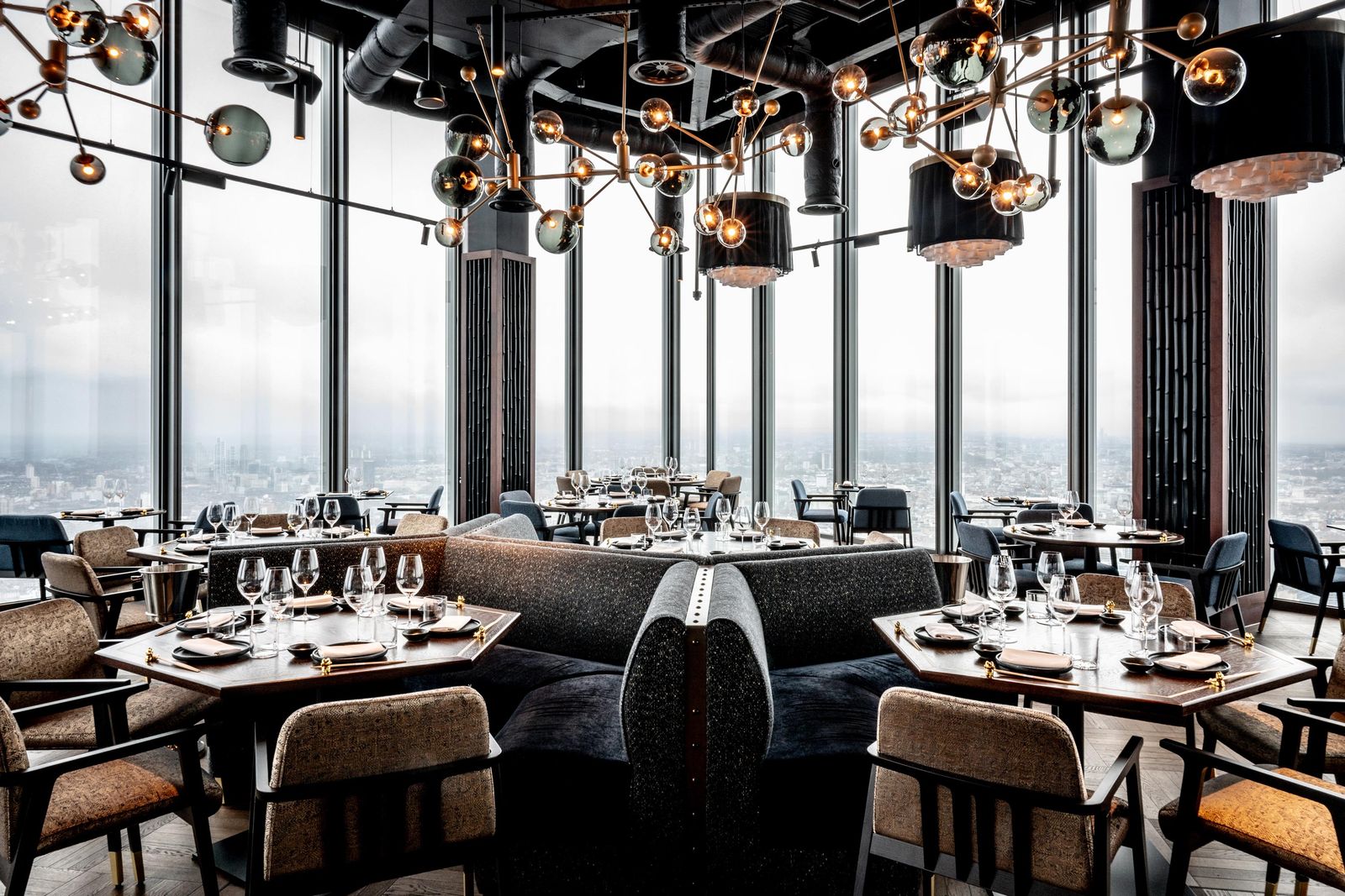 Image may contain Architecture Building Dining Room Dining Table Furniture Indoors Room Table Restaurant and Lounge