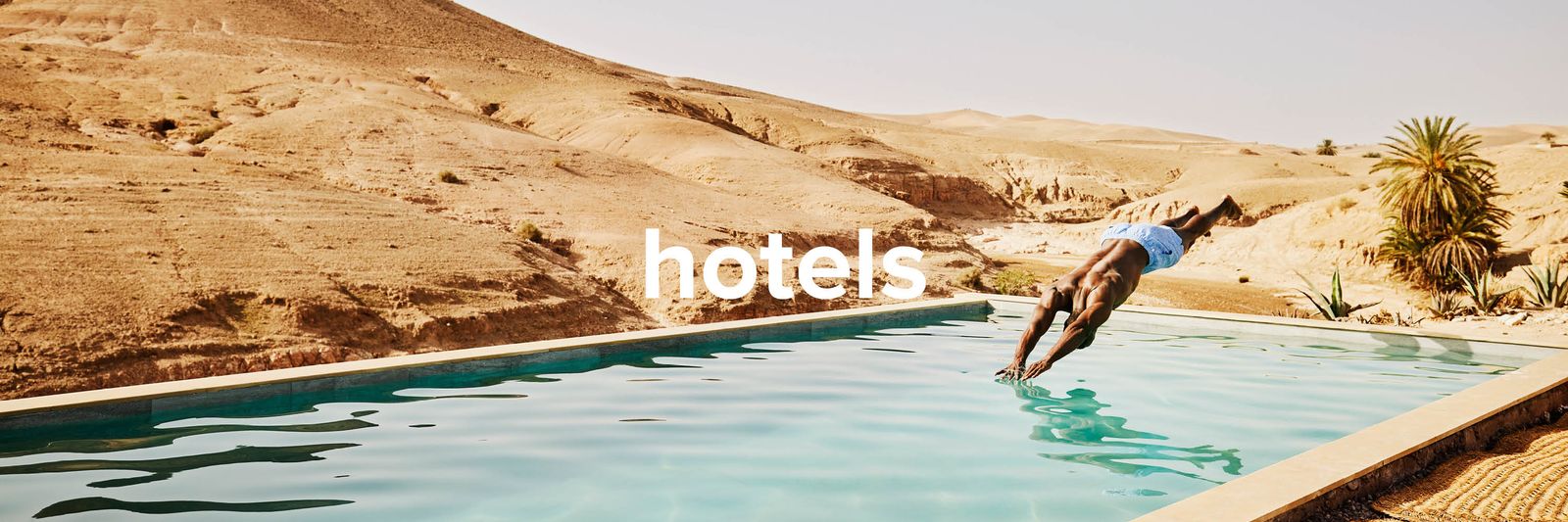 Image may contain Water Adult Person Leisure Activities Sport Swimming Water Sports and Diving